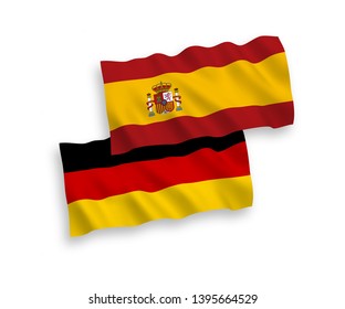 National Vector Fabric Wave Flags of Germany and Spain Isolated on White Background. 1 to 2 proportion.