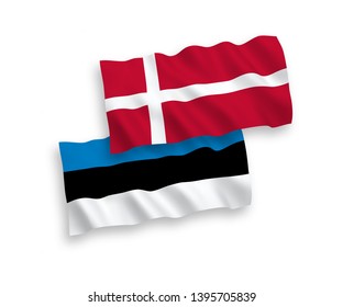 National vector fabric wave flags of Estonia and Denmark isolated on white background. 1 to 2 proportion.