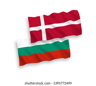 National vector fabric wave flags of Bulgaria and Denmark isolated on white background. 1 to 2 proportion.