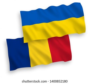National vector fabric wave flags of Romania and Ukraine isolated on white background. 1 to 2 proportion.