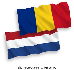 National vector fabric wave flags of Romania and Netherlands isolated on white background. 1 to 2 proportion.