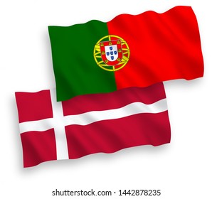 National vector fabric wave flags of Denmark and Portugal isolated on white background. 1 to 2 proportion.