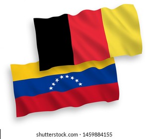 National vector fabric wave flags of Venezuela and Belgium isolated on white background. 1 to 2 proportion.