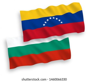 National vector fabric wave flags of Bulgaria and Venezuela isolated on white background. 1 to 2 proportion.