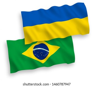 National vector fabric wave flags of Brazil and Ukraine isolated on white background. 1 to 2 proportion.