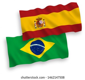 National vector fabric wave flags of Brazil and Spain isolated on white background. 1 to 2 proportion.