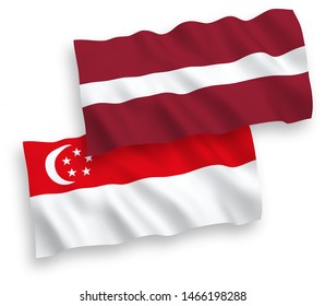 National vector fabric wave flags of Latvia and Singapore isolated on white background. 1 to 2 proportion.