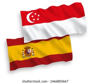 National vector fabric wave flags of Singapore and Spain isolated on white background. 1 to 2 proportion.