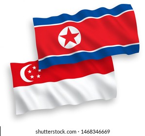 National vector fabric wave flags of North Korea and Singapore isolated on white background. 1 to 2 proportion.