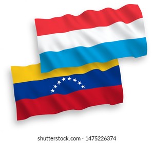 National vector fabric wave flags of Venezuela and Luxembourg isolated on white background. 1 to 2 proportion.