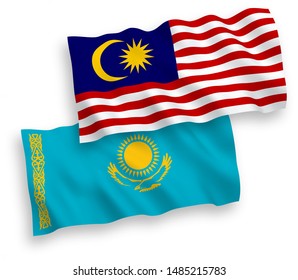 National vector fabric wave flags of Kazakhstan and Malaysia isolated on white background. 1 to 2 proportion.