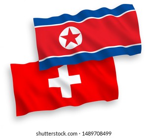 National vector fabric wave flags of North Korea and Switzerland isolated on white background. 1 to 2 proportion.