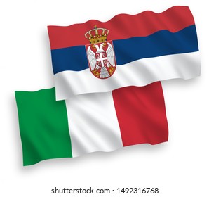 National vector fabric wave flags of Italy and Serbia isolated on white background. 1 to 2 proportion.