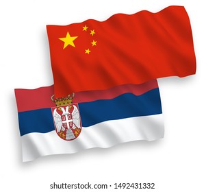 National vector fabric wave flags of Serbia and China isolated on white background 1 to 2 proportion.