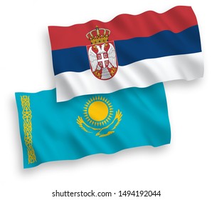 National vector fabric wave flags of Kazakhstan and Serbia isolated on white background. 1 to 2 proportion.
