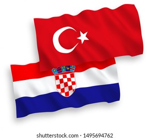 National vector fabric wave flags of Turkey and Croatia isolated on white background. 1 to 2 proportion.