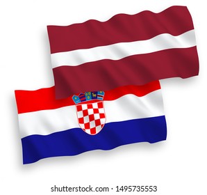 National vector fabric wave flags of Latvia and Croatia isolated on white background. 1 to 2 proportion.