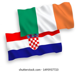 National vector fabric wave flags of Ireland and Croatia isolated on white background. 1 to 2 proportion.
