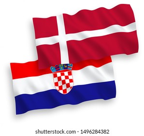 National vector fabric wave flags of Denmark and Croatia isolated on white background. 1 to 2 proportion.