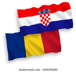 National vector fabric wave flags of Romania and Croatia isolated on white background. 1 to 2 proportion.