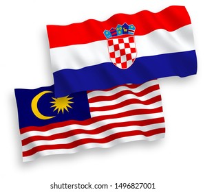 National vector fabric wave flags of Croatia and Malaysia isolated on white background. 1 to 2 proportion.