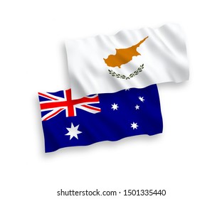 National vector fabric wave flags of Australia and Cyprus isolated on white background. 1 to 2 proportion.