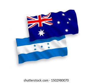 National vector fabric wave flags of Australia and Honduras isolated on white background. 1 to 2 proportion.