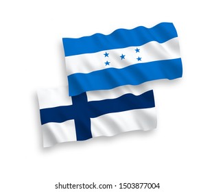 National vector fabric wave flags of Finland and Honduras isolated on white background. 1 to 2 proportion.