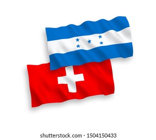 National vector fabric wave flags of Honduras and Switzerland isolated on white background. 1 to 2 proportion.