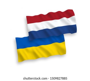 National vector fabric wave flags of Netherlands and Ukraine isolated on white background. 1 to 2 proportion.