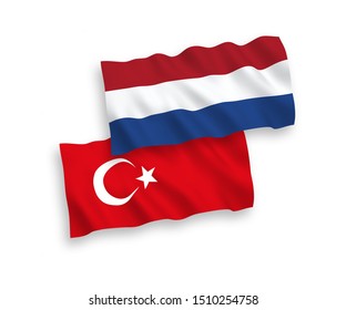 National vector fabric wave flags of Turkey and Netherlands isolated on white background. 1 to 2 proportion.