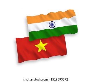 National vector fabric wave flags of India and Vietnam isolated on white background. 1 to 2 proportion.
