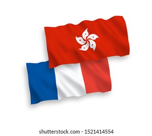 National vector fabric wave flags of France and Hong Kong isolated on white background. 1 to 2 proportion.