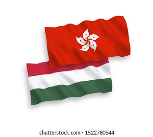 National vector fabric wave flags of Hong Kong and Hungary isolated on white background. 1 to 2 proportion.