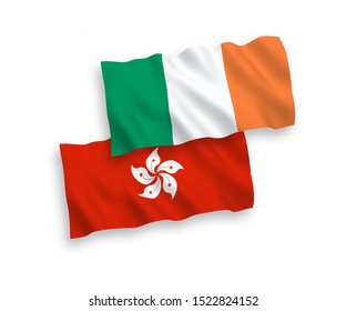 National vector fabric wave flags of Ireland and Hong Kong isolated on white background. 1 to 2 proportion.