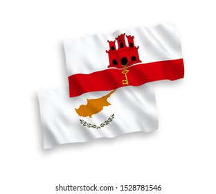 National vector fabric wave flags of Cyprus and Gibraltar isolated on white background. 1 to 2 proportion.