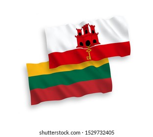 National vector fabric wave flags of Lithuania and Gibraltar isolated on white background. 1 to 2 proportion.