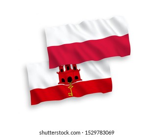 National vector fabric wave flags of Gibraltar and Poland isolated on white background. 1 to 2 proportion.