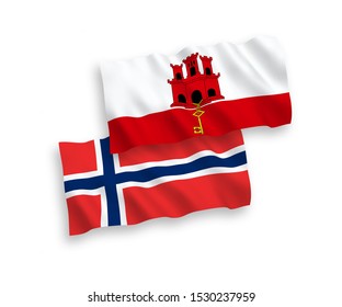 National vector fabric wave flags of Norway and Gibraltar isolated on white background. 1 to 2 proportion.