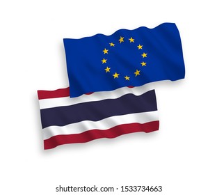 National vector fabric wave flags of European Union and Thailand isolated on white background. 1 to 2 proportion.