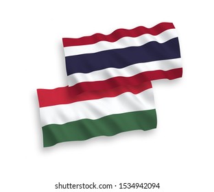 National vector fabric wave flags of Thailand and Hungary isolated on white background. 1 to 2 proportion.