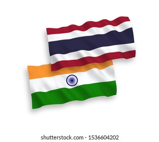 National vector fabric wave flags of India and Thailand isolated on white background. 1 to 2 proportion.