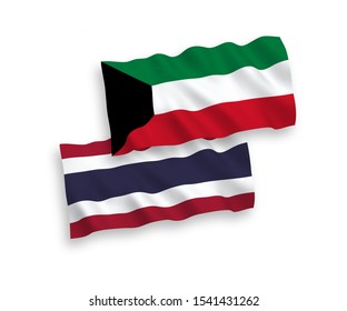 National vector fabric wave flags of Kuwait and Thailand isolated on white background. 1 to 2 proportion.