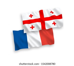 National vector fabric wave flags of France and Georgia isolated on white background. 1 to 2 proportion.
