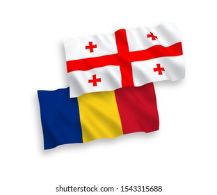 National vector fabric wave flags of Romania and Georgia isolated on white background. 1 to 2 proportion.