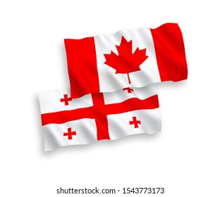National vector fabric wave flags of Canada and Georgia isolated on white background. 1 to 2 proportion.