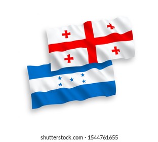 National vector fabric wave flags of Georgia and Honduras isolated on white background. 1 to 2 proportion.