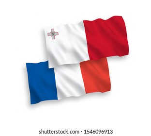 National vector fabric wave flags of France and Malta isolated on white background. 1 to 2 proportion.