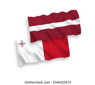 National vector fabric wave flags of Latvia and Malta isolated on white background. 1 to 2 proportion.