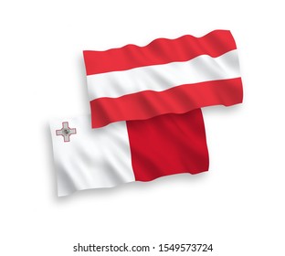 National vector fabric wave flags of Austria and Malta isolated on white background. 1 to 2 proportion.
